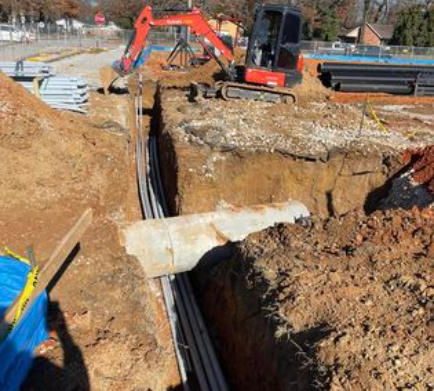 Underground excavation for electrical and water lines in the Rogers area. Once the trenching is done we also can do conduit installation.